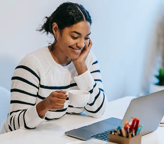 Woman looking at laptop