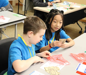 Students learning at one of UnitedOne's school branches