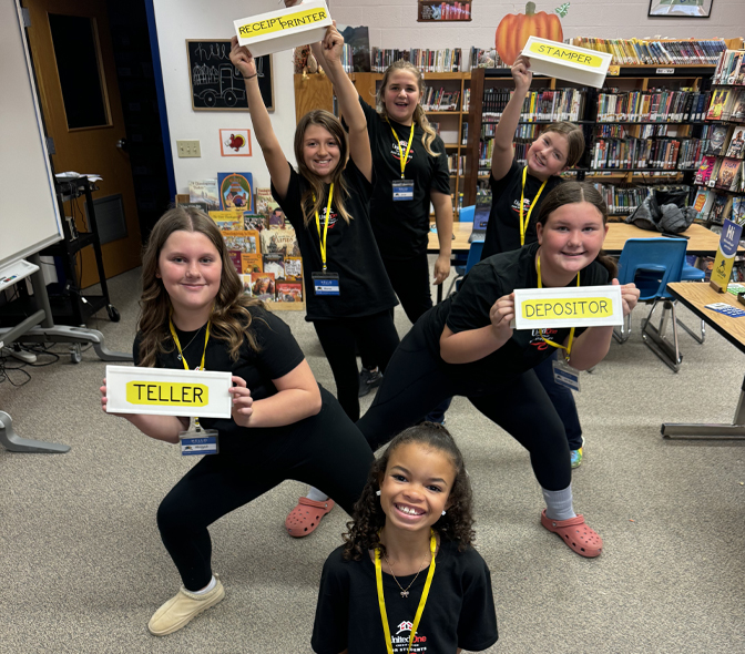 Image of two students Students at one of UnitedOne Credit Union's school branches